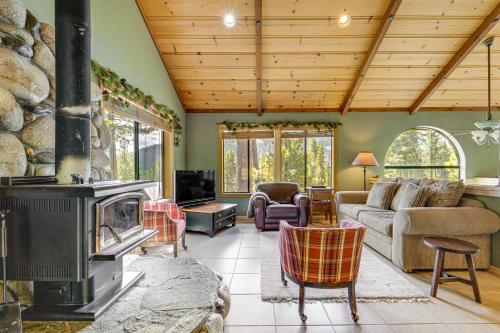 a living room with a fireplace and a couch at Close to Ski Slopes Tahoe Ski Chalet with Fireplace in Tahoe City