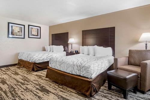 Letto o letti in una camera di Best Western Prescottonian