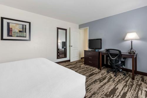 Letto o letti in una camera di Best Western Prescottonian