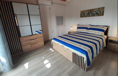 Katil atau katil-katil dalam bilik di Apartmani Matan Vir