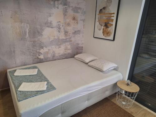 Tempat tidur dalam kamar di Kupidon