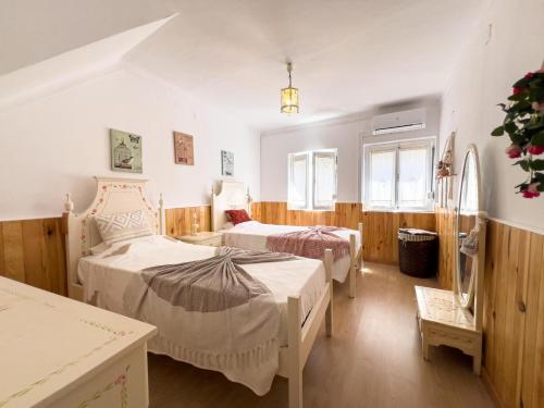 Postel nebo postele na pokoji v ubytování Casa Pais by Portus Alacer