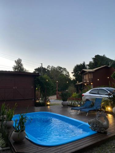 Bazén v ubytování Pousada Lua Nova Praia do Rosa nebo v jeho okolí