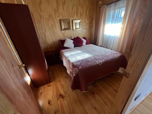 Postel nebo postele na pokoji v ubytování Cabaña Kin