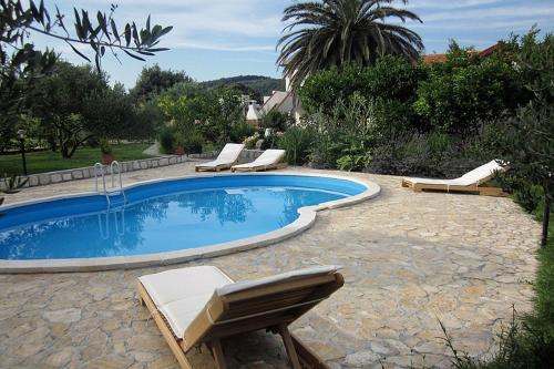 Family-friendly apartments with swimming pool Mundanije, Rab - 5072