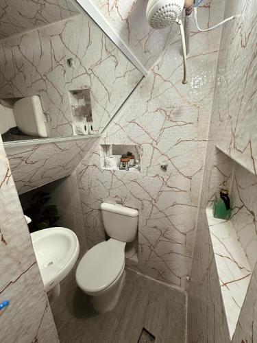 Et badeværelse på Loft Menor Aconchegante com Ar-Condicionado