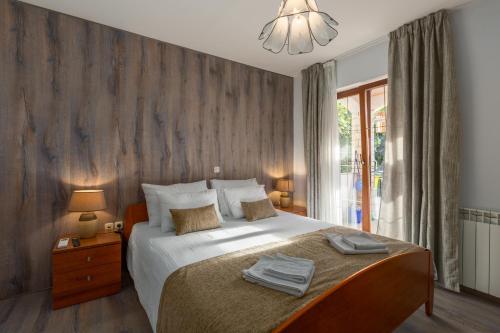 Ένα ή περισσότερα κρεβάτια σε δωμάτιο στο Apartment Vrsar 17473b