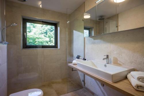 Koupelna v ubytování Appartement Herliana by NV-Appartements