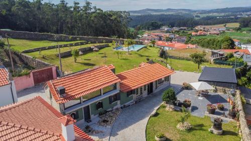 an aerial view of a house with a yard at Quintinha Sao Martinho Luxury 2 Suites Villa Eira with Jacuzzi in Vila do Conde