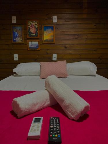 Postel nebo postele na pokoji v ubytování Pousada Lua Nova Praia do Rosa