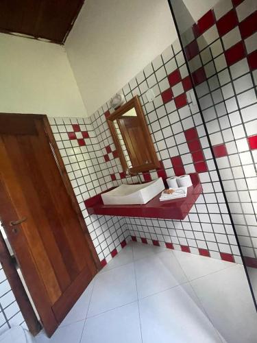 Ein Badezimmer in der Unterkunft Pousada Morro dos Navegantes