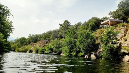 a view of a river from a boat at Lodge de Travo in Ventiseri