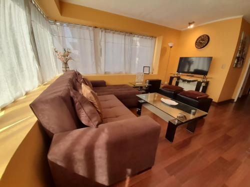 TV a/nebo společenská místnost v ubytování VIP Apartments Chile
