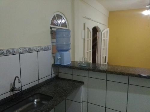 Kuchyň nebo kuchyňský kout v ubytování Pousada Jasmim Paraty