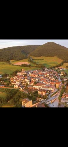 an aerial view of a small town in a city at La Casa di Rita in Fogliano