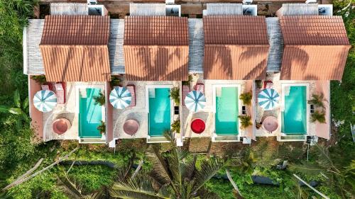an aerial view of a villa with a resort at Woywoy Escape Tabo - Adults Only in Ubud