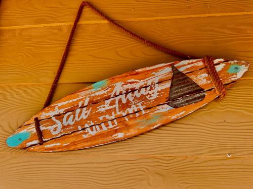 a wooden boat on top of a wooden table at Decades in Port Willunga