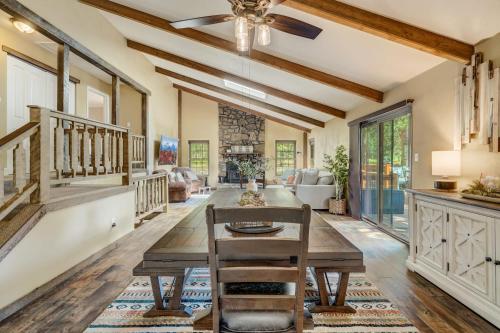 a dining room with a table and a ceiling fan at Buckskin Hideaway Hiking & Biking Trails BBQ in Monument