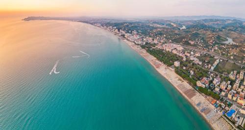 an aerial view of a beach and the ocean at Savana Modern Apartment by the sea in Golem