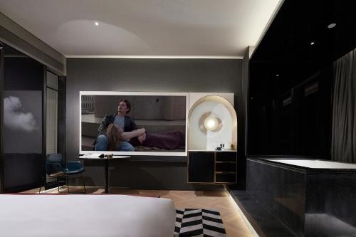 Un ou plusieurs lits dans un hébergement de l'établissement ISEYA Panoramic Hotel Chengdu Tianfu Square, Chunxi Road