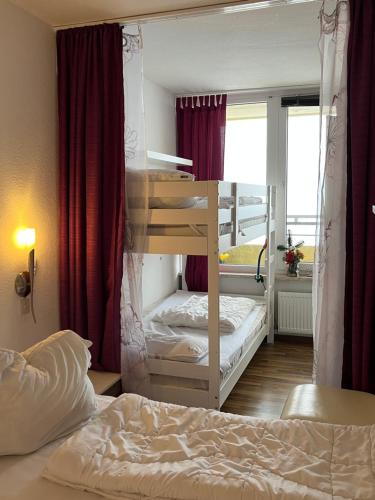 Una cama o camas en una habitación de Atempause und erholsame Zeit im Harz