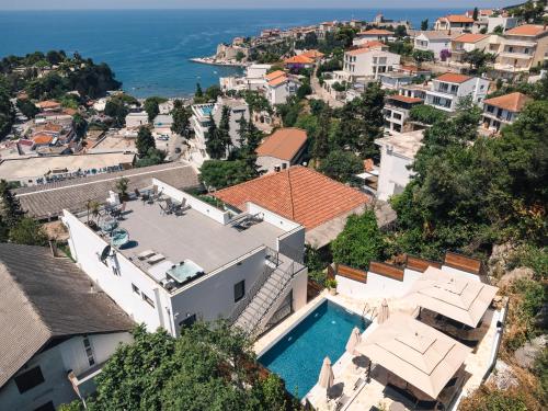 an aerial view of a house with a swimming pool at CASA BIANCA & Spa 2 in Ulcinj