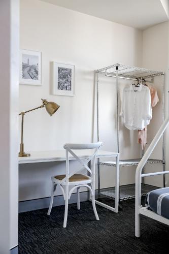 a bedroom with a desk and a chair and a bed at Wake Up! Sydney Central in Sydney