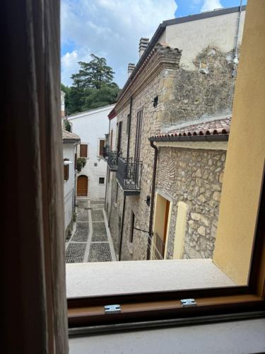 a view of an alley from a window at La farfalla del vicolo in Larino