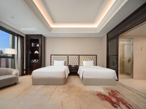 Ένα ή περισσότερα κρεβάτια σε δωμάτιο στο Crowne Plaza Chengdu Tianfu New Area by IHG
