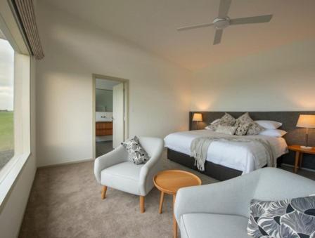 Postel nebo postele na pokoji v ubytování Oceanview Eco Villas