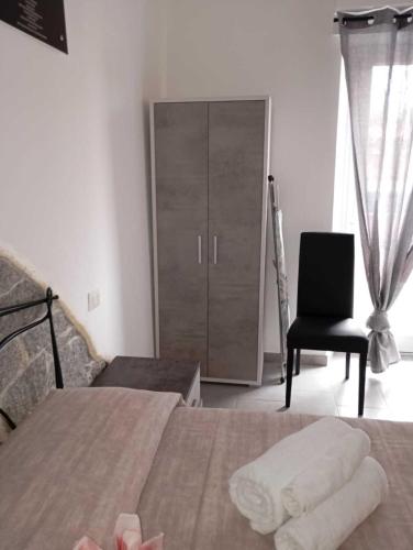 Postel nebo postele na pokoji v ubytování Parole di Sardegna