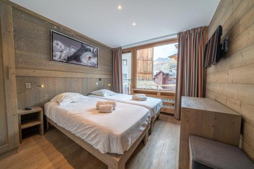 Postel nebo postele na pokoji v ubytování Appartement Le Rosset