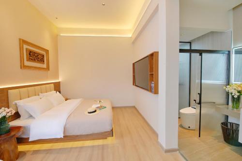 Koupelna v ubytování 夕露小榭南门机场大巴店Xiluxiaoxie MUXIN INN