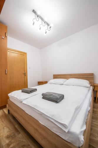Letto o letti in una camera di Apartament Średnia 16