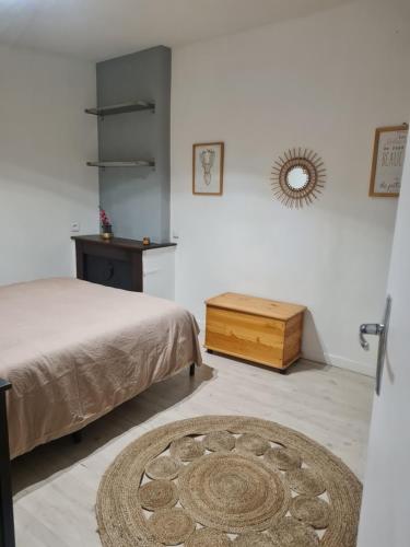 En eller flere senge i et værelse på Maison de ville cadurcienne plein centre