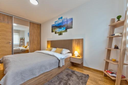 Postel nebo postele na pokoji v ubytování Stankovic-026 Planinski Spa