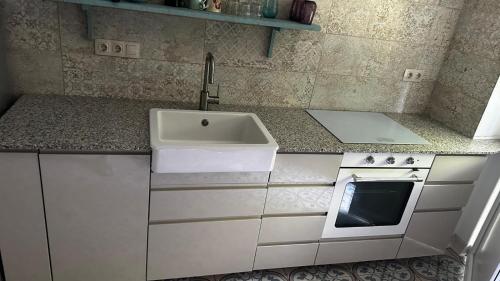 Η κουζίνα ή μικρή κουζίνα στο Cosy apartman in green Buda