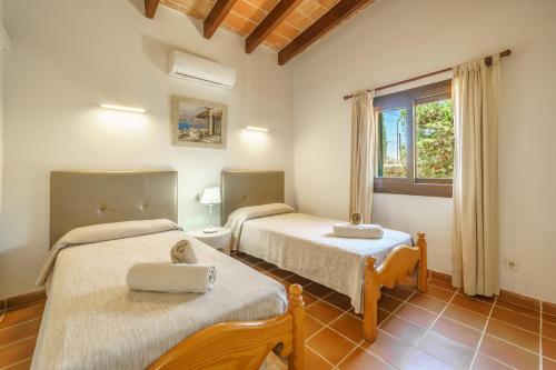 Posteľ alebo postele v izbe v ubytovaní Finca ROTES Pollensa by Mallorca Villa Selection
