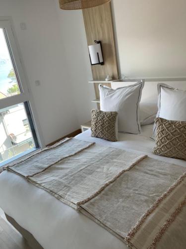 Hôtel Beauregard, The Originals Relaisにあるベッド