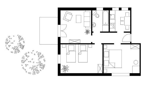a black and white floor plan of a house at Ferienwohnung Werner in Jork