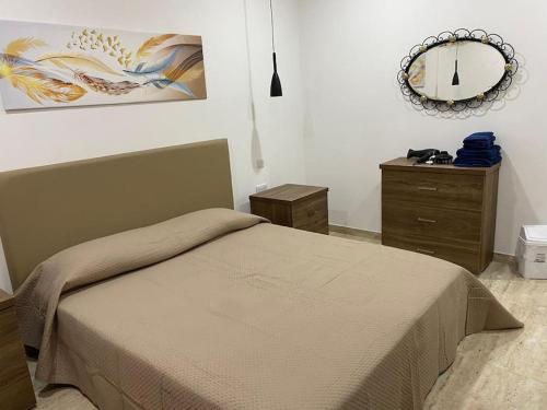 Ένα ή περισσότερα κρεβάτια σε δωμάτιο στο Cosy New Apartment