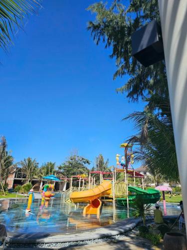 a water park with a bunch of slides at The Vista Beach Resort Phan Thiết in Phan Thiet