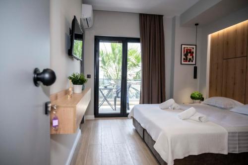 Postel nebo postele na pokoji v ubytování RiA BLU DELUXE HOTEL