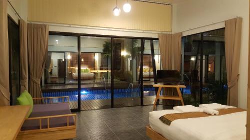 Postel nebo postele na pokoji v ubytování Jasmine Resort And Spa