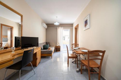 Televisyen dan/atau pusat hiburan di Manias Apartments
