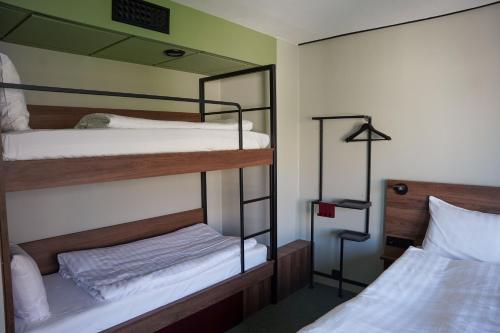 Postel nebo postele na pokoji v ubytování Comfort Hotel Panorama