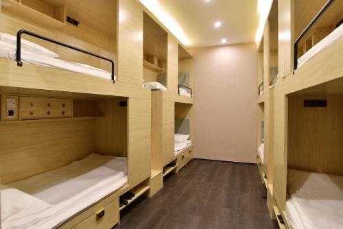 Katil atau katil-katil dalam bilik di Smiley's Long Time No See Hostel