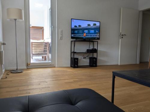 Μια τηλεόραση ή/και κέντρο ψυχαγωγίας στο Basti's Rooms&Breakfast - Self Checkin