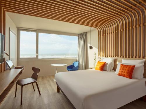 Postel nebo postele na pokoji v ubytování Novotel Thalassa Le Touquet