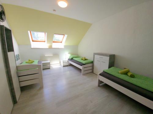 Ένα ή περισσότερα κρεβάτια σε δωμάτιο στο Apartments in Grüner Umgebung